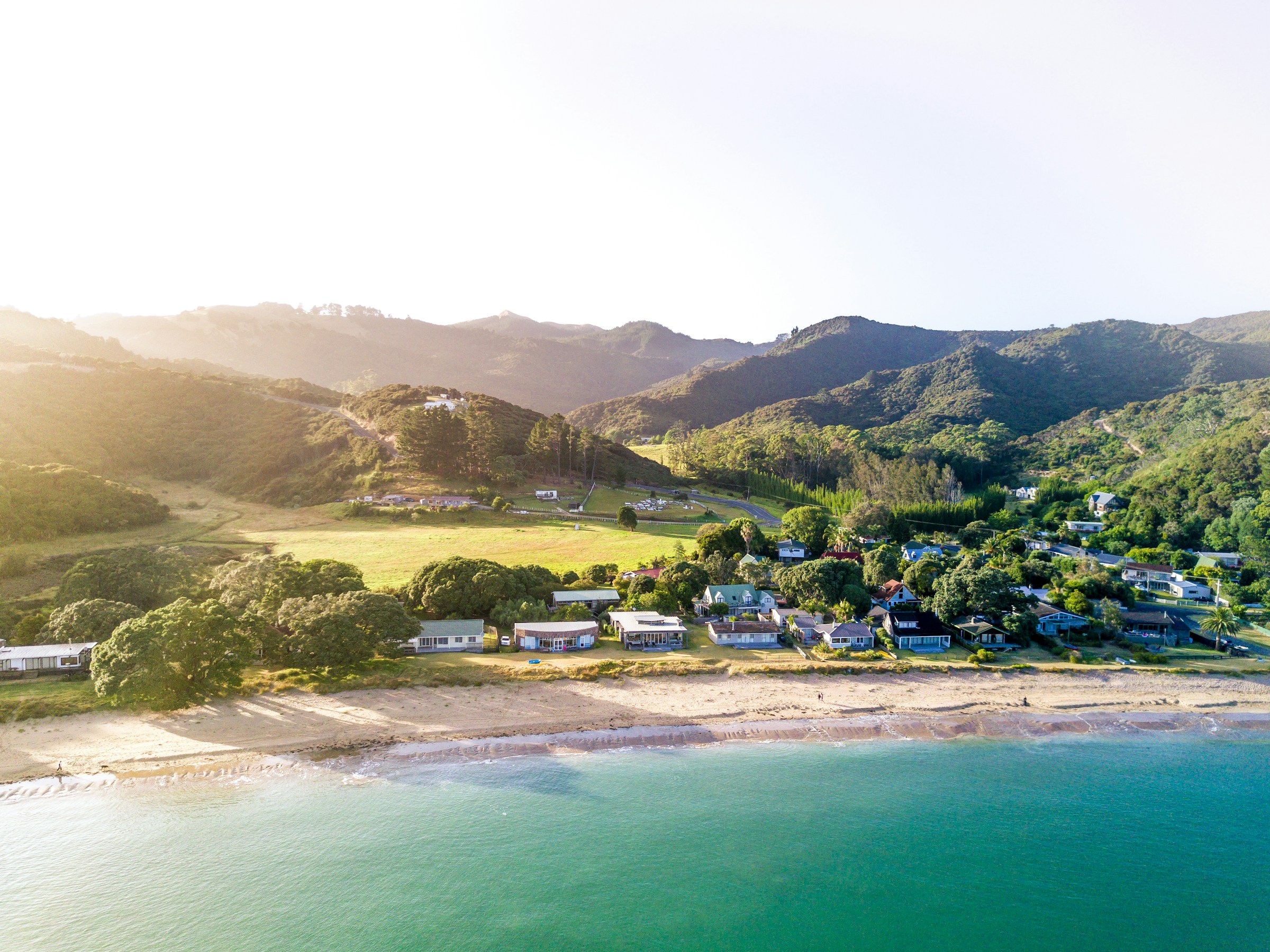 Aerial shot of a beachside settlement in New Zealand