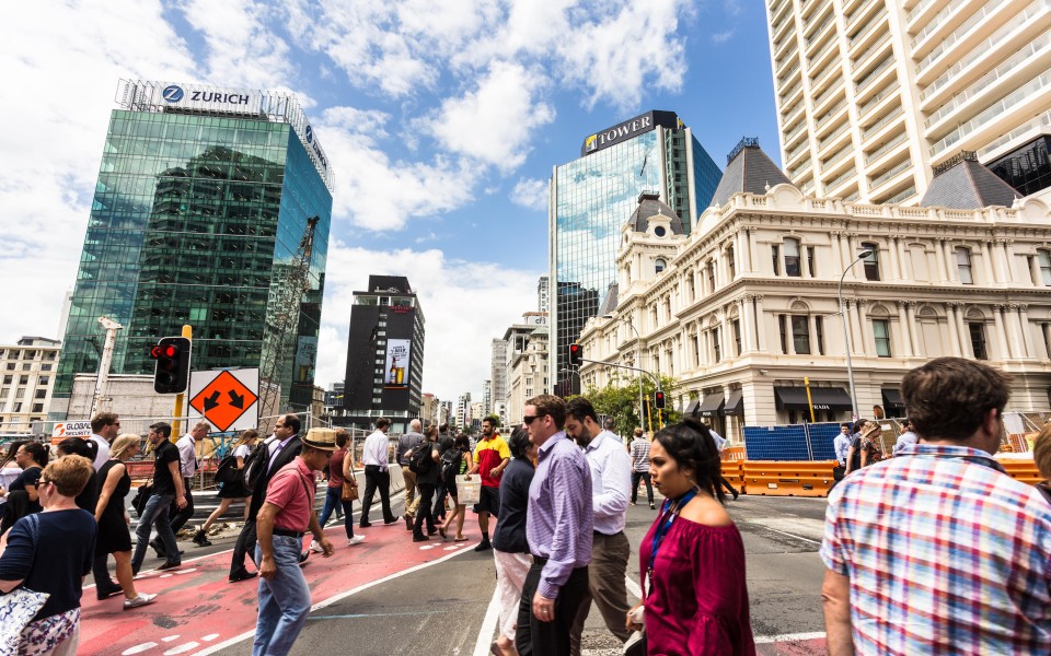Busy pedestrian crossing in Auckland, New Zealand